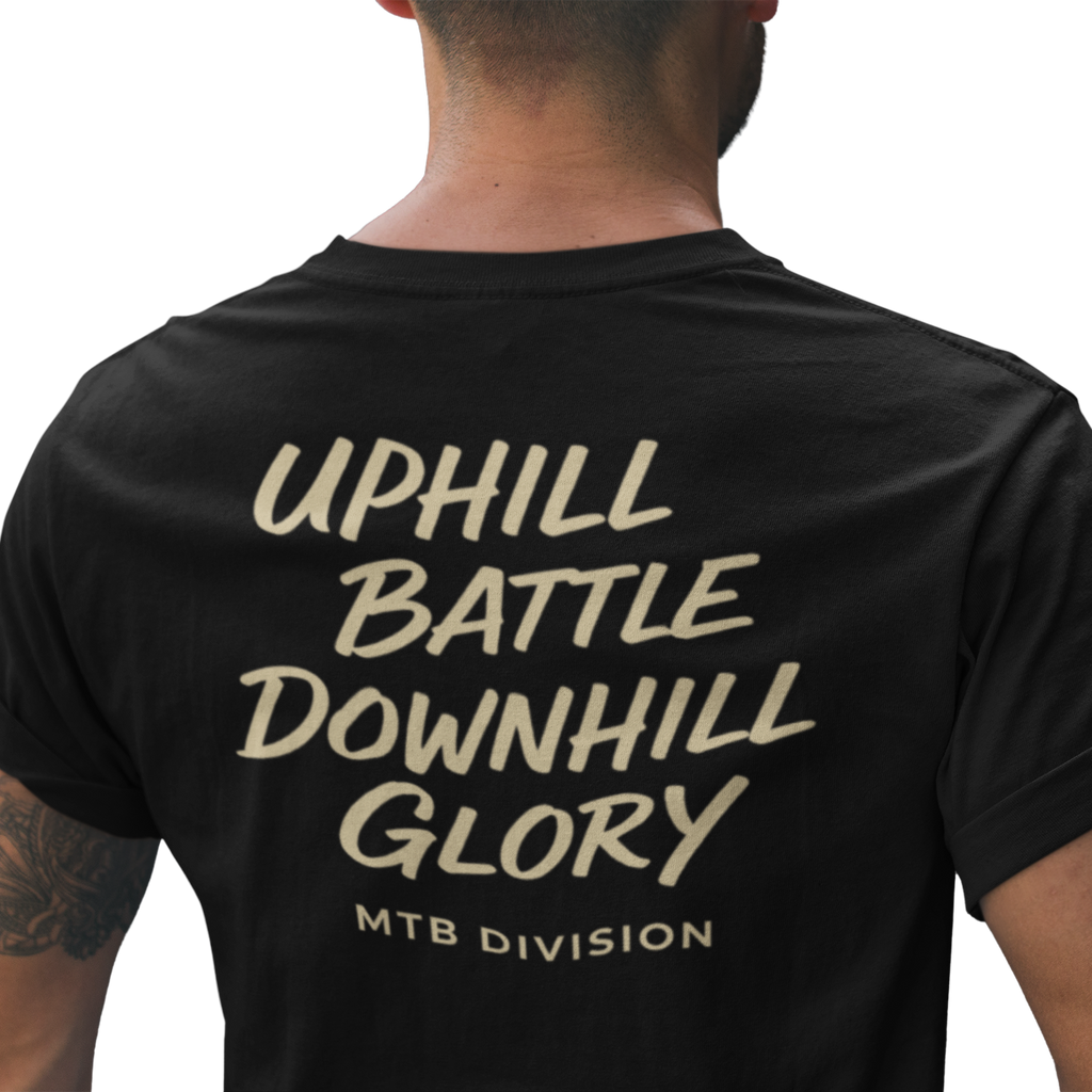 Black t-shirt with 'Uphill Battle Downhill Glory' text on the back, worn by a person.
