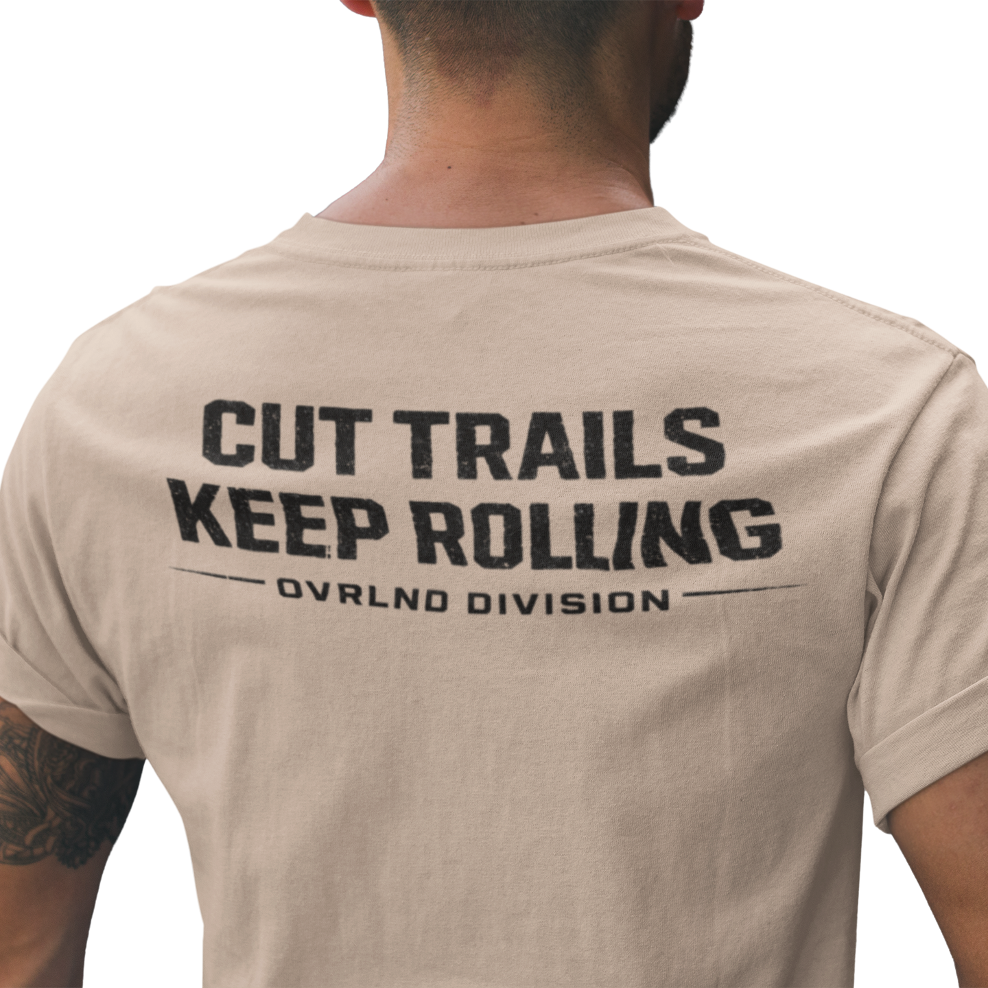 Beige t-shirt with 'Cut Trails Keep Rolling' text on the back overlanding t shirt
